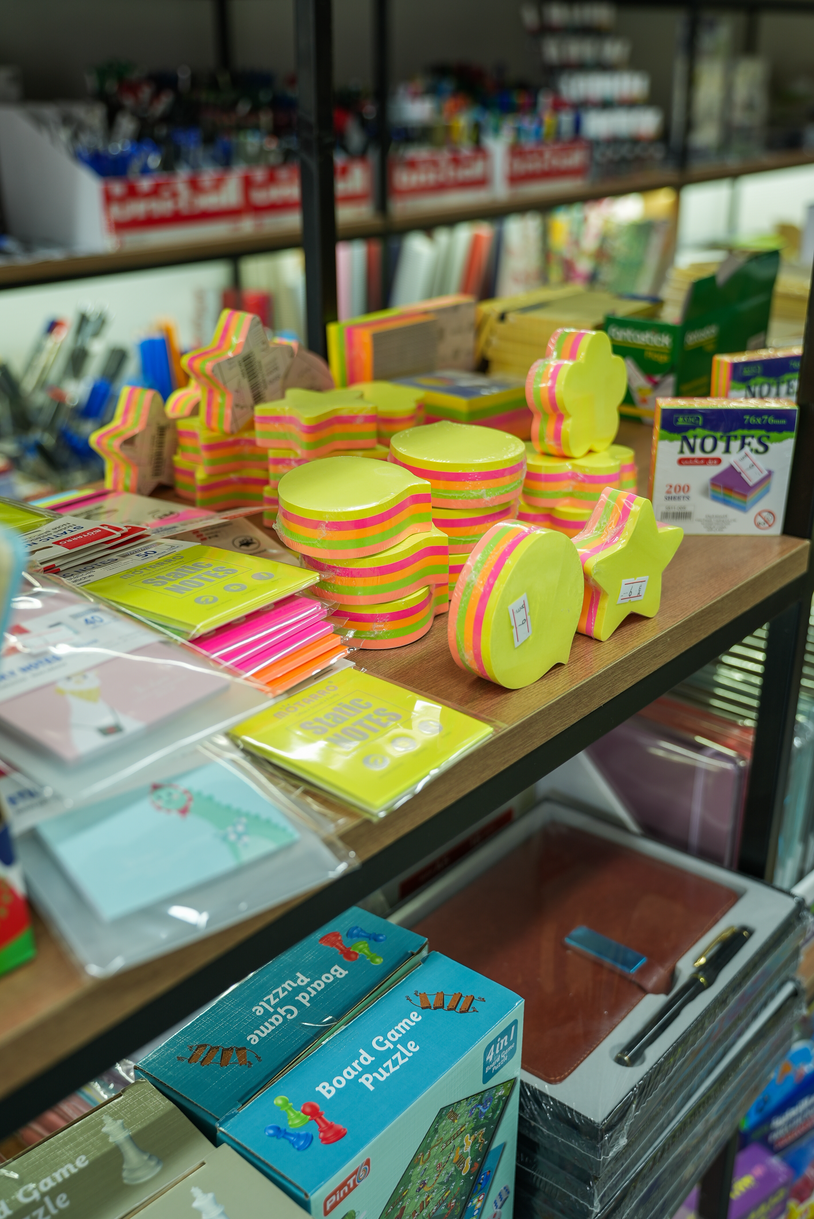 Colorful sticky notes and stationery accessories at Al Nukhbah