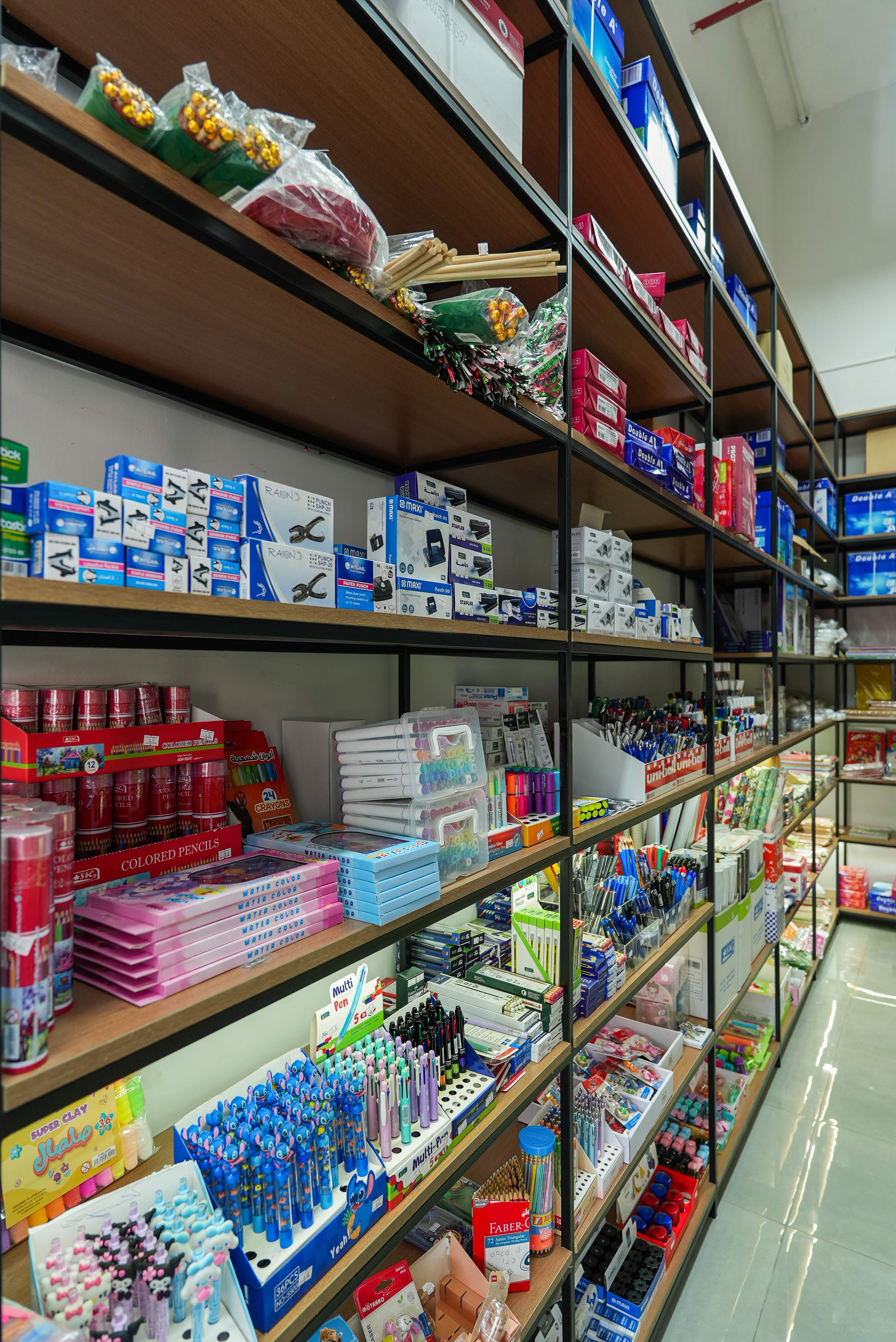 Pens, notebooks and office stationery aisle at Al Nukhbah